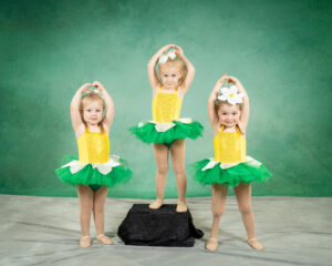 3 little dancers in sunflower costumes